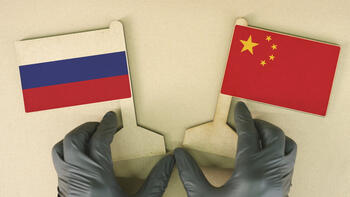 Russia-China-flags-gloves.jpg Russia-China-flags-gloves.jpg