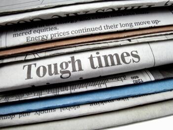 newspaper with tough times hedXSmall.jpg