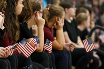 students-hold-miniature-american-flags-during-the-sackets-d0f3de-1024.jpg