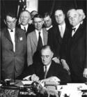 Roosevelt_signing_TVA_Act_(1933).jpg Roosevelt_signing_TVA_Act_(1933).jpg