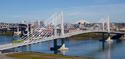 Tilikum_Crossing_with_streetcar_and_MAX_train_in_2016.jpg Tilikum_Crossing_with_streetcar_and_MAX_train_in_2016.jpg